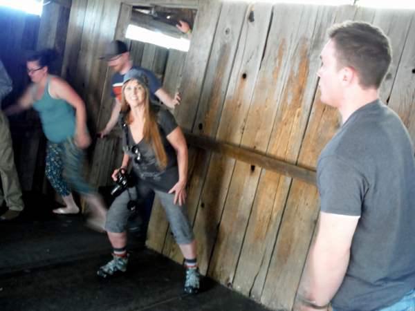 Karen Duquette trying to walk in the crooked cabin